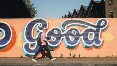 man walking beside graffiti wall - paradox of good intentions