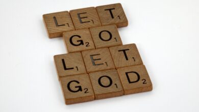 brown wooden blocks on white surface - Grace is God's unmerited favor